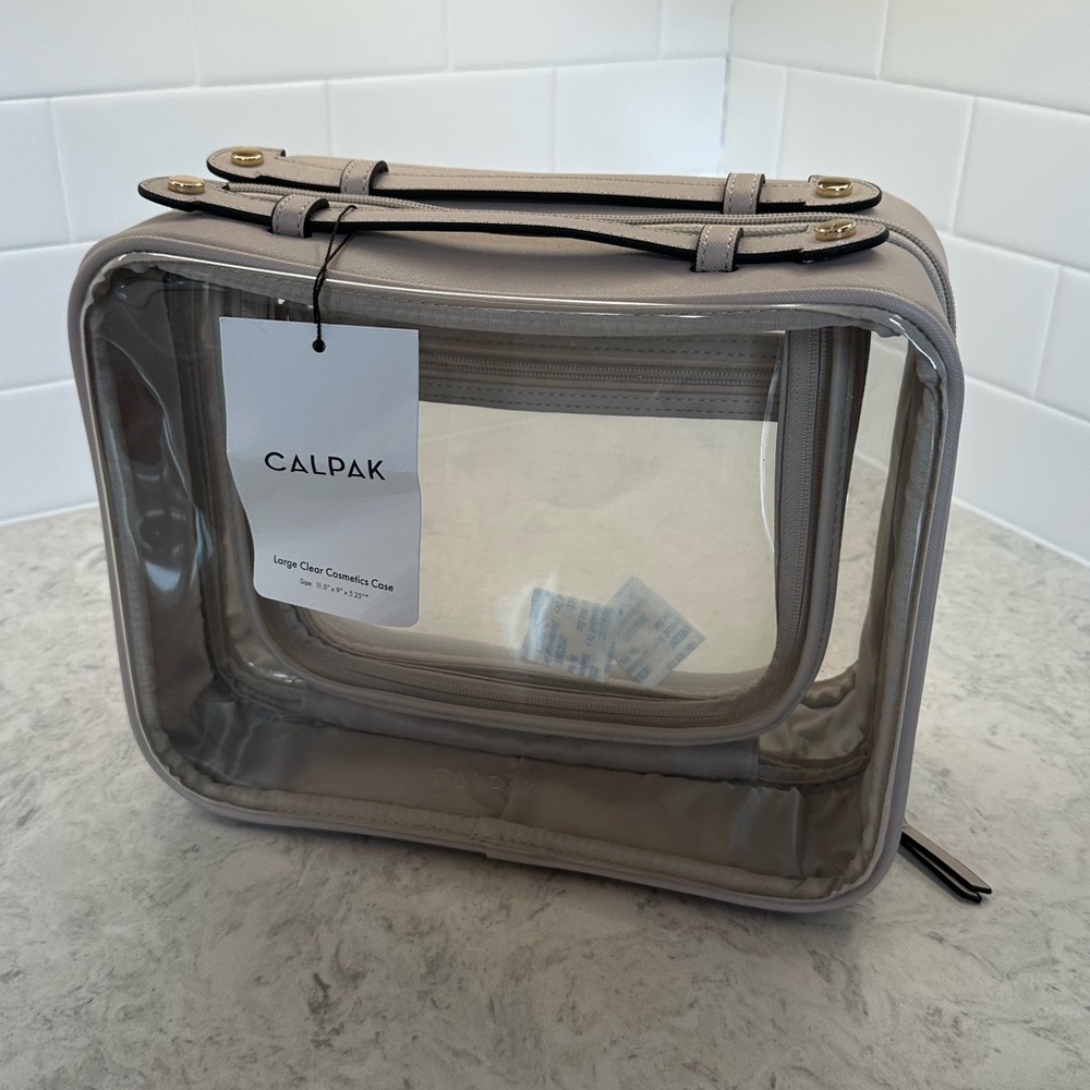 NWT Calpak Large Clear Cosmetics Case in Stone